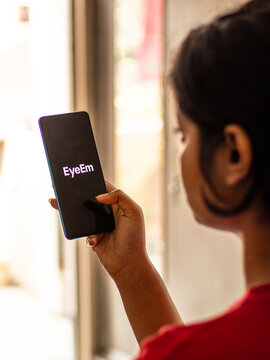 Assam, india - April 19, 2021 : EyeEm logo on phone screen stock image.