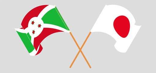 Crossed and waving flags of Burundi and Japan