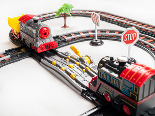 Railway for children to play, locomotives on a motor with batteries, railway tracks, signs, playing with trains