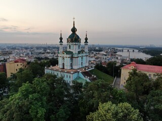 Aerial top view of Saint Andrew's church and Andreevska street from above, cityscape of Podol district