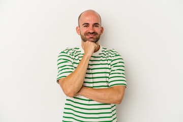 Young bald man isolated on white background smiling happy and confident, touching chin with hand.