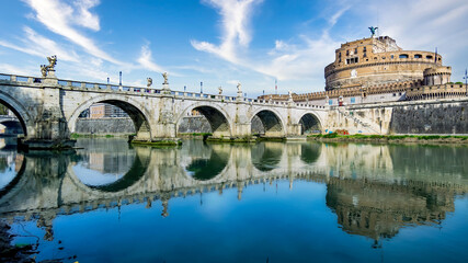 Obraz na płótnie Canvas Rome, Italy - April 2017: Ponte Sant'Angelo bridge and Castel Sant Angelo built over Tiber river