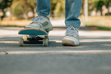 closeup of feet with skateboard