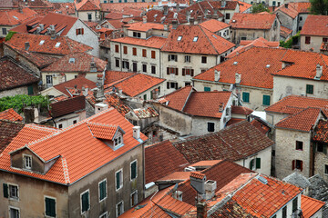 Fototapeta na wymiar Kotor old town roofs from Lovcen Mountain in Kotor, Montenegro. Kotor is part of the UNESCO World Heritage Site.