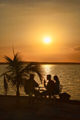 Fototapeta na wymiar Enjoying a sundowner at Punta Gorda, Cienfuegos, Cuba