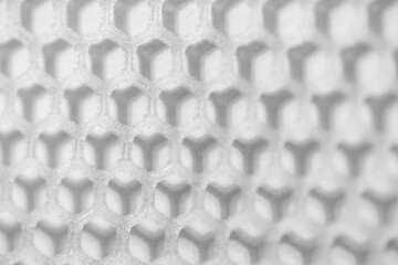 Hexagonal abstract background backdrop. Printed on a 3D printer with transparent plastic.