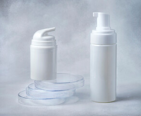cosmetic containers for foam or gel on white background
