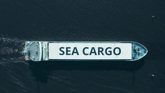 SEA CARGO text on a cargo ship, aerial view