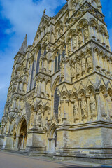 Fototapeta na wymiar Salisbury Cathedral. Built to the glory of God, this vibrant Cathedral church with Britain's tallest spire and best preserved Magna Carta is just 8 miles from Stonehenge