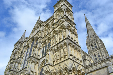 Fototapeta na wymiar Salisbury Cathedral. Built to the glory of God, this vibrant Cathedral church with Britain's tallest spire and best preserved Magna Carta is just 8 miles from Stonehenge