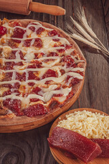 Brazilian sweet pizza with guava candy with cheese and condensed milk. (Pizza Romeu e Julieta).