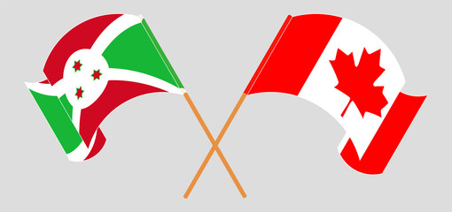 Crossed and waving flags of Burundi and Canada