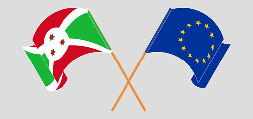 Crossed and waving flags of Burundi and the European Union