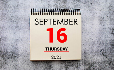 tear-off calendar sheet with date September 16, concept