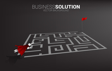 Silhouette of businessman flying over the maze to goal. Business concept for problem solving and finding idea.