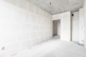 interior of the apartment without decoration in gray colors