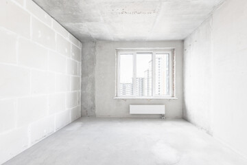 interior of the apartment without decoration in gray colors