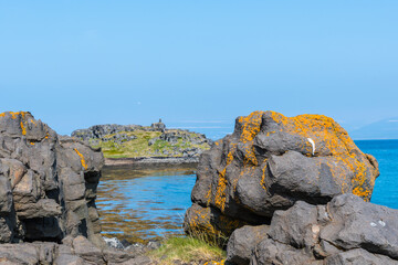 Fototapeta premium Rock formation on the coast on the countryside of Iceland