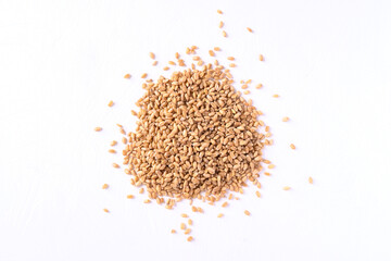 Pile of wheat grain on white background, Top view