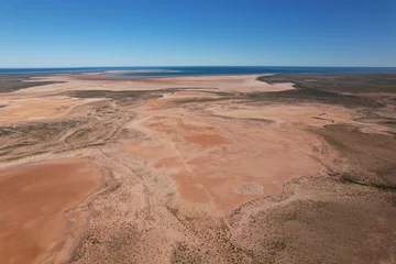 Tuinposter Outback Australia aerial wide shot over the picturesque dry drought affected river lake environment desert landscape of Western Australia © immimagery