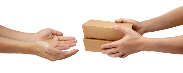 Hand give takeaway cardboard food boxes to other hand isolated on white