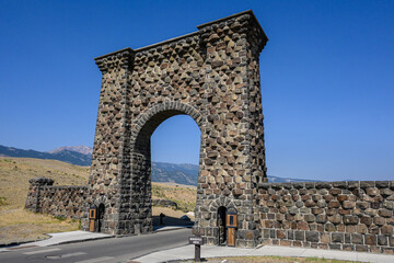 Fototapeta na wymiar Roosevelt Arch on a bright sunny day, Yellowstone National Park, USA 