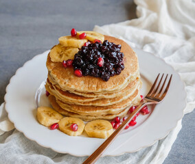 Healthy homemade meals. Banana Pancake with Pomegranate, Wild Blueberry Jam & Wild Honey. Ripen mashed banana, eggs, low fat milk, honey & blueberry jam.