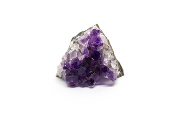 Crystal Stone macro, purple rough amethyst quartz crystals on white background