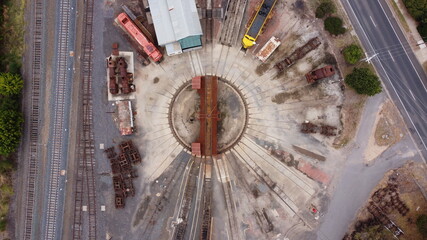 Top down view of a restored historic train turntable and steam engine maintenance and workshop...