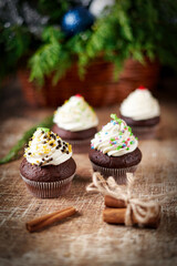 Cake chocolate muffins and cinnamon on christmas table