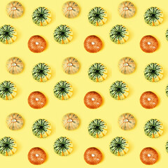 Creative seamless pattern with small round pumpkin. Autumnal holiday concept, fall, harvest, thanksgiving, halloween.