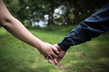 couple holding hands