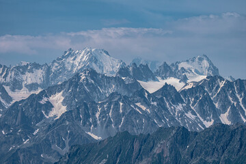 Naklejka na ściany i meble Melting glacier and snow in the summer in the Alps