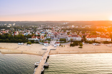 Wooden pier in Sopot in the morning with the colors of sunset. Poland. Europe - obrazy, fototapety, plakaty