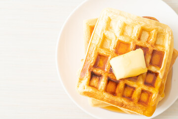 waffle stack with butter and honey