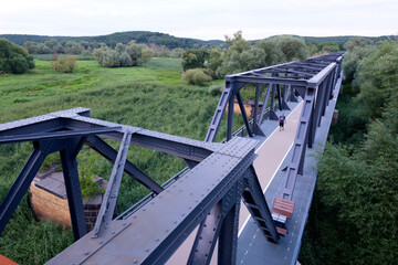 Siekierki, Poland August 17, 2021. A new bicycle route along the historic bridge on the border of Poland and Germany from Siekierki-Neurüdnitz.