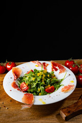 Rocket salad with dried Spanish ham