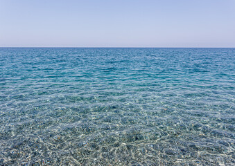 Panoramic view of a clear sea. Blue and crystalline Tyrrhenian Sea. Calabria, Italy