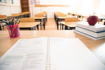Pencils and books in the classroom. Education concept.