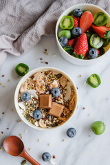 Homemade healthy snacks. Muesli Bowl with Mixed Berries. Full of nutritional values, vitamins,...