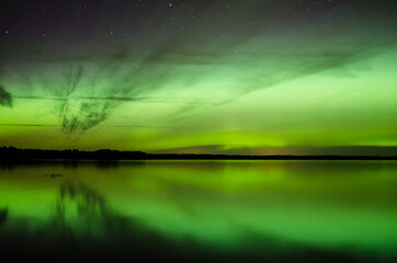 Aurora borealis, The Northern lights at the lake, Latvia.