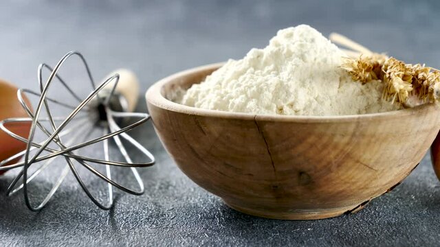baking food ingredient- flour, egg and rolling pin