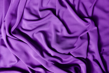 Smooth elegant violet satin texture can use as abstract background. Luxurious background design....
