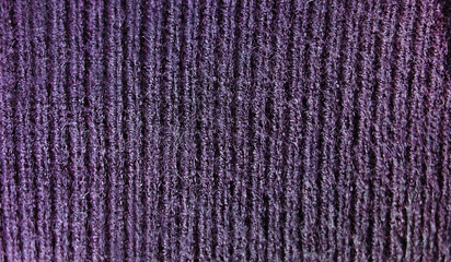 Smooth elegant violet satin texture can use as abstract background. Luxurious background design. Closeup purple texture