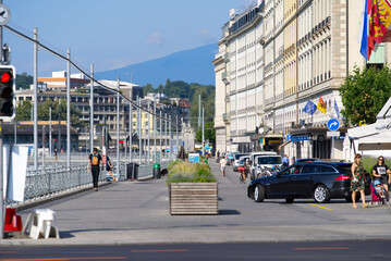 Fototapeta na wymiar Lake Geneva and river Rhone at City of Geneva on sunny summer morning. Photo taken July 29th, 2021, Geneva, Switzerland.