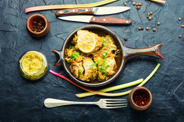 Tasty chicken meat baked with rhubarb