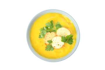Plate of pumpkin soup isolated on white background