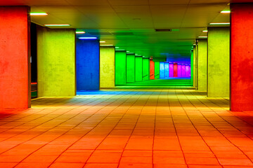 Dutch Travel Destinations. Mulitcolored Illuminated Rainbow Gallery Tunnel Near the NAI Building in...