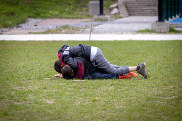 Two guys are fighting each other. Bullying. Aggression.