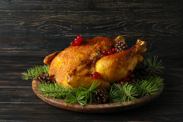 Concept of Christmas roast turkey on wooden table